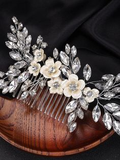 Bridal crystals and abalone seashell style flowerheads are assembled into a sparking bouquet on a top of this beautiful silver tone decorative hair comb. Large Wedding hair comb has many hand wired branches on all sides adorn with multi sized crystal leaves.This wedding theme hair comb integrates seamlessly into any hairdo. You can wear it with a high or low bun, or simply place it on the side for more casual but chic look. Large handmade epoxy acrylic flowerheads make this hair accessory especi Crystal Seashells, Pearl Bridesmaid Jewelry, Floral Wedding Hair, Decorative Hair Combs, Beach Jewelry Boho, Bridal Jewelry Necklace, Silver Head Piece, Hair Comb Bridal, Large Wedding