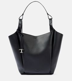 Find TOD'S Api Leather Tote Bag on Editorialist. The Tod's Api tote bag is crafted from leather and features a lobster-clasp fastening, top handles and a dust bag. It is unlined and made in Italy. Black Leather Tote Bag, Luxury Women Fashion, 72 Hours, Black Tote Bag, Leather Tote Bag, Womens Tote Bags, New Season, Leather Tote, Lobster Clasp