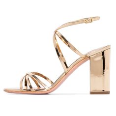 Not your average metallic gold heels. With its block heel, intricate straps, and metallic finish, KHLOE is a modern icon. Nothing will make that summer tan pop more than the KHLOE heels. Product details: Heel height: 3.4" Fits true to size Material: Patent leather