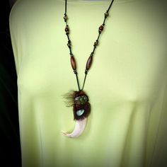 "This tribal boar tooth pendant with turquoise and labradorite cabochons and sheep fur on adjustable cord could become a nice talisman / amulet, \"spiritual guardian\" 🙃😉 Pendant size is ~4\" (10cm). Leather cord length can be adjusted in accordance with your preferences, just let me know the preferred length upon checkout. The item will be delivered to you by registered airmail service. 👆 NB❗️❗️❗️I HIGHLY recommend using PAYPAL payment option upon checkout! Items paid by any method other tha Bohemian Brown Electroformed Necklaces, Brown Wire Wrapped Necklaces For Festival, Brown Wire Wrapped Necklace For Festival, Festival Brown Wire Wrapped Necklaces, Handmade Unique Turquoise Necklace For Healing, Adjustable Turquoise Pendant Necklace With Spiritual Style, Adjustable Spiritual Turquoise Pendant Necklace, Brown Hand Wrapped Spiritual Necklaces, Brown Hand Wrapped Spiritual Necklace