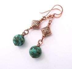 These mosaic turquoise boho style earrings feature large 12mm (1/2 inch) beads dangling from beautiful, handmade diamond shape artisan copper beads and copper hooks. Mosaic turquoise is an assembled stone made up of turquoise gemstone with other stones in colors of blue turquoise, green, tan and brown to near black in random patterns. I've wire-wrapped them with darkened copper headpins to little circle connectors with a twist design, then suspended them from the diamond shape bead station. The Bohemian Nickel-free Round Beaded Earrings, Copper Jewelry With Matching Round Bead Earrings, Adjustable Bohemian Round Bead Earrings, Bohemian Turquoise Beaded Round Earrings, Turquoise Round Copper Earrings, Adjustable Turquoise Beaded Copper Earrings, Turquoise Copper Dangle Jewelry, Bohemian Nickel-free Round Beads Jewelry, Nickel-free Turquoise Jewelry For Crafting