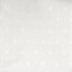 a white wallpaper with hexagonal design on the top and bottom part of it