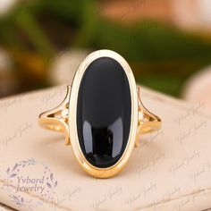 Please confirm your US size when you make an order) ❤Jewelry Details -Gold Type : 10k gold / 14k gold / 18k gold / Platinum / 925 sterling silver (Choose One in Material Option) -Center Stone: Natural Black Onyx Stone Size: 9*19mm carat weight: 5.2ct Band Width: about 2mm SKU: YR1129 ~*-*~Purchase Guarantee: - All our jewelry is handmade, and each process is refined. - 14 Day Refund Guarantee. - All our products are Free Shipping. - Free Gift Box&Packing. ~*-*~Please contact us if you need service: 1. Ring Resizing. 2. Metal Change(PT950/10k/14k/18k White/Yellow/Rose Gold). 3. Engraving ring (less than 10 letter). 4. Accept customization. We believe that our quality, attention to detail, design and customer service make us stand out from the competition. If you have any questions, please l 14k Gold Black Ring With Bezel Setting, 14k Gold Black Rings With Bezel Setting, 2024 Holidays, Black Gemstone Ring, Wedding Anniversary Ring, Jewelry Details, Ring Bezel, Gold Statement Ring, Wedding Anniversary Rings