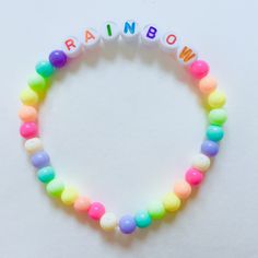 Cute pastel rainbow bracelets, handmade Bohemian Rainbow Bracelets With Letter Beads, Trendy Rainbow Friendship Bracelets For Everyday, Trendy Everyday Rainbow Friendship Bracelets, Rainbow Casual Handmade Beaded Bracelets, Handmade Rainbow Casual Jewelry, Casual Handmade Rainbow Beaded Bracelet, Pastel Colorful Beads Bracelets As Gift, Pastel Colorful Beads Bracelet As Gift, Pastel Bracelets With Colorful Beads For Gift