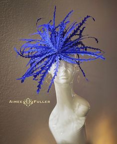 Aimee Fuller Kentucky Derby Fascinator  THIS LISTING is for the blue. Various colors available seasonally; please inquire.    Handmade fascinator with a flourish of dazzling feathers. This piece is fun, elegant, dramatic, and beautiful from all angles, and will have all eyes on you on your special day.    Perfect for the bride, or for your next gala/special event. Easy-to-wear headband fascinator makes a statement and can be worn to a myriad of events: Royal Ascot, Easter, bridal, derby-wear, De Blue Structured Crown Hat For Spring, Blue Spring Hat With Structured Crown, Spring Blue Hat With Structured Crown, Blue Curved Brim Headpiece For Royal Ascot, Blue Curved Brim Headpiece For Kentucky Derby, Blue Hat Headpiece For Races, Blue Feathered Costume Hats And Headpieces For Spring, Blue Fitted Headpiece With Structured Crown, Spring Blue Feathered Costume Hat