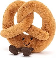 a stuffed animal with two large pretzels on it's back and one smaller pretzel in the middle