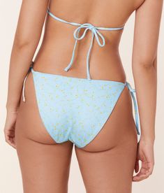 Andie Swim was was launched in 2017 with a core principle: make swimsuit shopping easier. Focus on materials, comfort, and sustainability, each of these pieces is designed to make you feel more amazing when you’re wearing less. Alluring and provocative, the String Bikini Bottom in Satin Powder Ditsy Bloom is the itsy bitty bikini you have always dreamed of wearing. Product Details 82% recycled nylon, 18% spandex. Adjustable ties. Size and Fit This item fits true to size. Care Instructions Rinse Spring Seamless Swimwear With Tie-side Bottom, Seamless Spring Swimwear With Tie-side Bottom, Seamless Tie-side Bottom Swimwear For Spring, Spring Swimwear With Adjustable Straps, Fitted Swimwear With Adjustable Straps For Spring, Spring Swimwear With Moderate Back Coverage, Spring Swimwear With Moderate Back Coverage And Stretch, Summer Poolside Bottoms With Adjustable Straps, Spring Poolside Swimwear With Adjustable Straps