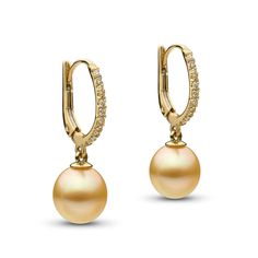 This popular earring design features lustrous Golden South Sea 9.0-10.0 mm pearls in smooth drop shapes, dangling below an impressive 14-karat gold setting with 11 sparkling diamonds on each ear. There are 22 diamonds of VS1-GH quality with a total carat weight of 0.22 cttw. Jewellery Pearl, Popular Earrings, Golden Pearl, Earrings Golden, Golden South Sea Pearls, White Pearl Earring, Golden Earrings, Pearl And Diamond Earrings, Diamond Dangle Earrings