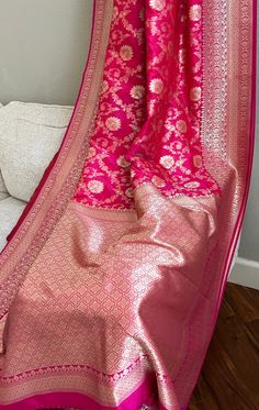 🌺Beautiful Semi Katan Silk Banarasi Saree in Rani  pink Color. 🌺Ethnic Traditional Semi Katan Banarasi Saree with all over floral jaal butta with thread weaving gold. . 🌺Blouse piece comes with the saree.🌺. Ready to wear saree Fall , Pico and Tassels done 🌺perfect for wedding and parties. Length: 6 m (Unstitched Blouse piece included). 🌺Wash care: Dry clean only. 🌺The product color may slightly vary due to photographic lighting sources or your computer settings. 🌺 please contact us if you have any questions regarding the product. Rani Color Banarasi Saree, Pink Banarasi Saree Blouse Design, Rani Pink Saree Silk, Light Pink Banarasi Saree, Rani Pink Banarasi Saree, Fanaa Film, Pink Banarasi Lehenga, Pink Wedding Saree, Rani Pink Saree