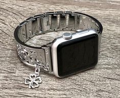 High Quality Premium Shiny Silver Color Band for Apple Watch All Series Comfortable Bangle with Secure Clasp Lock, Includes Extra Links and Pins Tool to Resize Wristband To Preferred Fitment Adjustable Size Fits 5.5 to 8 Inches (need to add or remove extra links) Super Light Bracelet - Weighs Around 1.2 oz 18mm Wide, Designed And Handmade by Simeon D Jewelry Not For Other Models. Tracker Is NOT Included Follow my Studio for Updates & New Designs Silver Adjustable Rectangular Watch Bands, Adjustable Stainless Steel Watch Accessories As Gift, Trendy Silver Watch Bands As Gift, Adjustable Stainless Steel Apple Watch Band For Gift, Adjustable Stainless Steel Apple Watch Band Gift, Silver Stainless Steel Apple Watch Band As Gift, Silver Stainless Steel Apple Watch Band Gift, Elegant Stainless Steel Apple Watch Band For Gift, Elegant Stainless Steel Apple Watch Band As Gift