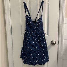 Perfect Spring/Summer/Fall Dress! Navy With White Polka Dots. Cross Cross Straps In The Back. White Buttons All The Way Down The Front. New With Tags! Polka Dot A-line Mini Dress For Summer, Polka Dot Sleeveless Mini Dress For Beach, Sleeveless Polka Dot Mini Dress For Vacation, Sleeveless Polka Dot Mini Dress For Beach, Polka Dot Mini Sundress For Summer, Polka Dot Mini Dress For Beach In Summer, Polka Dot Mini Dress For Beach And Summer, Polka Dot Summer Mini Dress, Polka Dot Summer Beach Dress