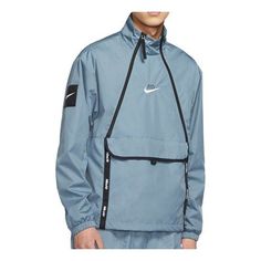 Nike Air Woven Reflective logo Printing Casual Sports Stand Collar Jacket Blue CU4119-031 (Men's) Nike Nylon Track Jacket With Pockets, Nike Functional Track Jacket For Streetwear, Nike Technical Track Jacket For Outdoor, Nike Urban Track Jacket For Outdoor Activities, Nike Functional Windbreaker For Sports, Urban Nike Track Jacket For Outdoor, Sports Outerwear With Logo Patch For Fall, Fall Sports Outerwear With Logo Patch, Technical Sports Windbreaker With Pockets