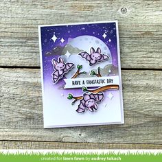 a card with some pink flowers on it and the words have a fantastic day written in white