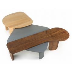 three wooden stools stacked on top of each other, one with a wood seat