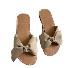 Nwt By James Design Suede Carol Sandal Slide With Bow Detail, Size 7 Nwt With Flaws, Staining On The Suede And Some Marks On The Bottom Sole. Please Review Pictures No Box Casual Khaki Sandals For Summer, Casual Khaki Sandals For The Beach, Khaki Casual Sandals For Spring, Beige Flat Flip Flops For Beach Season, Beige Flip Flops For Beach Season, Chic Leather Sandals For Beach Season, Beige Slip-on Flip Flops For Beach Season, Beige Slide Flip Flops For The Beach, Beige Slide Flip Flops For Beach