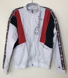 Champion Premium Reverse Weave Vintage Track Jacket Size XS.  Made in Vietnam  Shell: 100% Polyamide  Lining: 100% Polyester  Machine wash, tumble dry  Pre-owned in great condition  Full Zipper  Embroidery in great condition  2 Front Pockets  Length 24" Width 20" Pit to Pit 20.5" Shoulder to Shoulder 22" Sleeve Length 23" (Measurement take while item was laying down)  FridaFinds9 Policies:  -No returns accepted.  -We encourage all buyers to ask questions before they buy. We are more than happy t White Urban Track Jacket For Gym, Urban Style White Track Jacket For Gym, White Urban Style Track Jacket For Gym, Urban Sports Outerwear With Crew Neck, Functional White Sweatshirt For Streetwear, Functional White Streetwear Sweatshirt, Urban Long Sleeve Track Jacket For Sports Season, Sporty Long Sleeve Windbreaker For College, Sporty Long Sleeve College Windbreaker