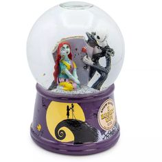 a snow globe with an image of jack and sally