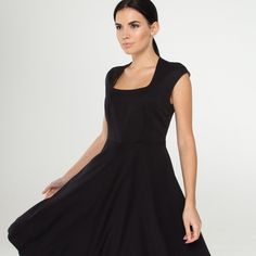 "A viscose midi dress featuring a square neckline, cap sleeves, concealed side zip, and a fit and flare silhouette. - Fit and flare silhouette - Square neckline - Cap sleeves - Knee length (midi) - Concealed side zipper. - Color: Black - Partly lined (top) Fiber: viscose - 60%, elastan - 5%, polyester - 35%,lining - 95% viscose, 5 % elastane. Estimated shipping time: 10-12 business days You may feel free choosing the size. Just send us your measurements (bust, waist, hips, height). We will defin Knee-length Fit And Flare Midi Dress, Black A-line Midi Dress With Fitted Bodice, Chic Evening Dresses With Cap Sleeves, Fitted Bodice Square Neck Midi Dress, Formal Fit And Flare Midi Dress With Square Neck, Formal Square Neck Fit And Flare Midi Dress, Square Neck Midi Dress With Fitted Bodice, Fit And Flare Knee-length Dress With Flattering Cut, Knee-length Fit And Flare Dress With Flattering Cut