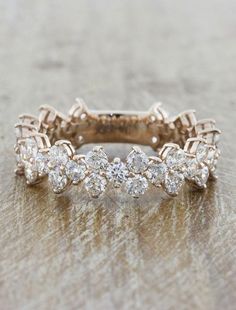 an image of a wedding ring with diamonds