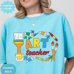 Discover the perfect Art Teacher Shirt with our Comfort Colors® collection, ideal for showing appreciation and as a back to school gift for art teachers. This Art Teacher Definition Shirt makes a thoughtful gift for art lovers and educators alike, available in various tops, tees, t-shirts, and tshirts. For an Oversized Look order 1 to 2 sizes larger than your normal size. 🌟100% ring-spun cotton 🌟Heavy fabric (6.1 oz/yd² (206.8 g/m 🌟Relaxed fit RETURNS: All products are made-to-order and becau Cotton Art With Graphic Print For Artistic Expression, Artistic Cotton Art With Graphic Print, Artsy Cotton Art With Graphic Print, Back To School Graphic Print T-shirt Gift, School Spirit Graphic T-shirt As Gift, Back To School Graphic Print T-shirt As Gift, Trendy Blue School T-shirt, Graphic Design Cotton Art Tee, Trendy Blue T-shirt For School