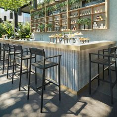 an outdoor bar with chairs and plants on the wall