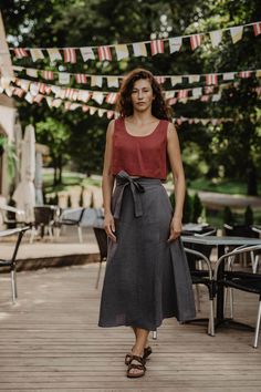 "A deep scoop neckline sleeveless crop top is the perfect fit to match our high-waisted linen pants or skirts. The casual chic look is guaranteed. Choose from 15 colors and 6 sizes. * ABOUT This listing is for 1 IRIS wrap skirt Medium-weight linen (approx. 190 gsm) Made from 100% certified European linen (OEKO TEX certified) Stone washed for maximum softness Available in 6 sizes Available in 15 colors * SIZES AND COLORS IN THE PICTURES Model Aistė is 177cm/5'8 tall and wearing charcoal IRIS in size S Please note that colors may vary due to different monitors and browsers. To ensure that you get the exact color you desire, we recommend ordering linen swatches: https://www.etsy.com/listing/922916804/linen-fabric-color-swatches-amourlinen  * SIZE CHART XS: US 2-4/ UK 4-6/ EU 32-34 S: US 6/ UK Cotton Maxi Skirt For Summer Brunch, Casual Linen Wrap Skirt For Spring, Fitted Linen Summer Skirt, Fitted Linen Skirt For Summer, Summer Wrap Long Skirt For Brunch, Summer Linen Maxi Skirt In Relaxed Fit, Summer Linen Maxi Skirt Relaxed Fit, Summer Relaxed Linen Maxi Skirt, Chic Long Linen Wrap Skirt