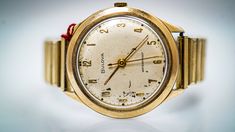 "For Sale: (1)K043 1950's Vintage Bulova Wristwatch PLEASE READ ENTIRE DESCRIPTION BEFORE PURCHASING Beautiful 10k gold plated men's Bulova watch. Perfect for a gift and a night out on the town. Specifics: Bulova Approximately Automatic Case width: 32.0 mm Lug width: 16 mm Length: N/A\" Weight: 50.1 grams **Please be patient & allow up to several weeks for delivery** (Despite the \"estimated delivery date\") (We've had packages reach their destination within a few days, others have taken up Vintage Gold Watch Bands, Vintage Yellow Gold Analog Watch, Retro Gold Watches With Chronometer, Gold Retro Watches With Chronometer, Bulova Mens Watches, Bulova Accutron, 1950s Mens, Bulova Watches, Filigree Ring