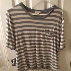 Nwot Gap Grey-And-White Striped T-Shirt. Size Sm. Soft + Stretchy With A Slightly Drapey Fit. 100% Viscose. A Little Wrinkled, But Nothing A Little Heat Can't Take Care Of :) Love The Shirt, But Need To Downsize! White Graphic Tee By Gap, White Gap Graphic Tee, Gap White Graphic Tee T-shirt, White Relaxed Fit T-shirt By Gap, Gap T-shirt For Everyday Spring Wear, Gap Short Sleeve Tops For Everyday, Casual Gap T-shirt, Gap Graphic Tee For Spring, Gap Graphic Tee Tops For Summer