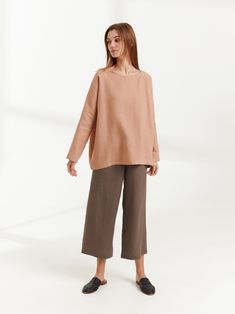 "RUMI is a long sleeve loose fit linen blouse. DETAILS - Oversized fit - Long sleeves - Boat neckline - 100% lightweight European linen fabric - Cut and sewn to order just for you in our studio COLOR - Camel, you can also choose other colors above - Fabric samples are available here https://www.etsy.com/listing/586569696/linen-fabric-samples SIZING & FIT - Relaxed, loose fit - Length is approximately 26 inches / 66 cm - Bust is approximately 26.5 inches / 67 cm - Measurements taken from a si Oversized Long Sleeve Beige Blouse, Versatile Long Sleeve Beige Blouse, Versatile Beige Long Sleeve Blouse, Versatile Long Sleeve Neutral Top, Beige Long Sleeve Blouse With Relaxed Fit, Beige Linen Long Sleeve Top, Long Sleeve Beige Linen Top, Casual Long Sleeve Flax Blouse, Beige Long Sleeve Linen Top