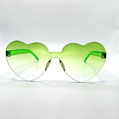 Lime Oversized Heart Sunglasses - Green Ombre Heart Dive Into The Ultimate Festival Vibes With Our Summer Love Oversized Heart Sunglasses! Whether You're Grooving Under The Sun Or Moon, These Sunglasses Are Your Perfect Accessory To Dance The Day And Night Away. Choose From A Variety Of Colors And Ombre Patterns To Match Your Unique Style And Make A Bold Statement Wherever The Beat Takes You. Key Features: 1. Vibrant Colorful Lenses: Experience The World Through A Kaleidoscope Of Colors, Turning Rave Gear, Heart Shaped Frame, Festival Gear, Y2k Accessories, Green Sunglasses, Coach Sunglasses, Versace Brand, Dolce Gabbana Sunglasses, Heart Sunglasses