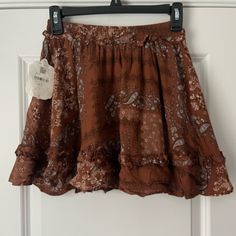 Nwt Western Style Ruffle Skirt. Super Cute Pattern Brown Spring Skirt With Elastic Waistband, Brown Skirted Bottoms For Summer, Spring Brown Skirt With Elastic Waistband, Brown Bohemian Mini Skirt For Summer, Brown Flowy Skirt With Elastic Waistband, Bohemian Brown Mini Skirt For Summer, Bohemian Brown Mini Skirt For Spring, Flowy Brown Skirt With Elastic Waistband, Fall Bohemian Mini Skirt