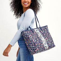 Perfect for all of your everyday adventures, this large coated-canvas tote has room for everything. Take it to work, school, vacation – wherever! 100% cotton with polyurethane coating and trim Interior features a hanging slip pocket Zip closure. Dimensions: 14. 25" w x 13. 5" h x 5. 5" d Handle/Strap Strap drop 12. 0" Trim Material : Faux Leather Vera Bradley Outlet Large Every Day Tote Bag in Provence Paisley Berry Blue | 100% Cotton Reversible Tote Shoulder Bag For School, Casual Reversible Shoulder Bag For School, Canvas Bag For Weekend In Spring, Canvas Bags For Spring Weekend, Everyday Reversible Coated Canvas Bag, Canvas Bag For Weekend And Spring Season, Reversible Coated Canvas Everyday Bag, Reversible Coated Canvas Bag For Everyday Use, Reversible Coated Canvas Tote Bag