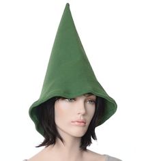 a female mannequin wearing a green hat on top of it's head