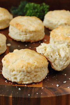 biscuits on a cutting board with parsley in the background