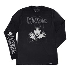 Bring some anarchy to your wardrobe with the Elvira Mistress Fiend Black long sleeve Shirt! This exclusive shirt features art inspired by the Misfits' groundbreaking Horror Business single, paying homage to horror punk scene legends. It's printed on a premium soft style feel 100% ring spun cotton long sleeve shirt. Hand printed in Los Angeles by the official Elvira's Bootique. Fitted Long Sleeve Punk T-shirt, Edgy Long Sleeve T-shirt With Screen Print, Gothic Long Sleeve T-shirt For Fall, Long Sleeve Punk Tops With Graffiti Print, Long Sleeve Graphic T-shirt For Concerts, Punk Long Sleeve Tops With Graffiti Print, Fitted Long Sleeve Halloween Shirt, Fitted Long Sleeve Shirt For Halloween, Edgy Long Sleeve T-shirt For Fall