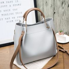 Brand Name: NIGEDUOrigin: CN(Origin)CN: GuangdongLining Material: Synthetic LeatherMain Material: PUPlace Of Origin: GUANG DONG ProvincePlace Of Origin: GUANG DONG ProvinceShape: BucketOccasion: VersatileExterior: NONEModel Number: women handbags BB301Closure Type: zipperDecoration: NONEHardness: SoftGender: WOMENPattern Type: SolidInterior: Cell Phone PocketInterior: Interior Zipper PocketStyle: FashionColor: black, green, red, graySIZE: 24X25X11cm (Length x Height x Width)Totes,casual Crossbod Womens Messenger Bag, Woman Casual, Casual Crossbody Bag, Casual Tote Bag, Girly Bags, Trendy Handbags, Vintage Leather Bag, Luxury Purses, Casual Tote