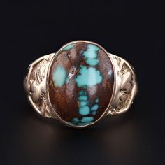 Contrasting earth tones and vibrant blues in this beautiful natural turquoise ring! The 10k gold ring depicts a woman on the shoulders of the band who's arms are designed to look like they're holding the center stone. The mounting dates to the 1920s-1930s, while the turquoise is a later replacement. The face of the ring measures 0.65 inches by 0.5 inches wide, and the turquoise is in good condition with a chip on the underside of the stone. The ring is currently a size 8 but can be resized free Diamond Climber Earrings, Antique Opal Ring, Vintage Turquoise Ring, Diamond Flower Pendant, Turquoise Gold Ring, Woman Ring, 10k Gold Ring, Kids Rings, Jewelry Post