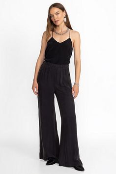 Crafted from a lightweight flowing fabric, the Corianne Easy Pants are a wardrobe essential. Featuring an elastic waist and pockets at the seam, these relaxed fit trousers are finished with a flowing flared leg. Pair with a classic tee or tank and flat leather slides for an easy polished daily look. Johnny Was Women's Corianne Easy Pant in Black, Size Large, Leather Versatile Black Viscose Bottoms, Chic Wide-leg Viscose Pants, Elegant Ankle-length Relaxed Fit Harem Pants, Chic Straight Leg Wide Leg Viscose Pants, Elegant Relaxed Fit Viscose Bottoms, Versatile Relaxed Fit Viscose Pants, Versatile Wide Leg Viscose Pants With Elastic Waistband, Chic Straight Leg Rayon Pants, Chic Viscose Wide Leg Straight Pants