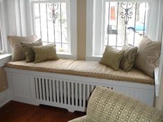 two different views of a living room with couches and bookshelves in it