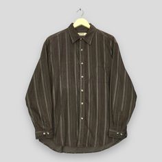 Vintage Kansai Jeans Vertical Striped Flannel Shirt Large Kansai Japan Stripes Brown Shirt Kansai Yamamoto Work Buttondown Oxfords Size L Good Used Condition. No Stains and No Holes. Size (On Tag) : Size L **To make sure if it FITS YOU, refer at the exact measurements. Size Measurement (All measurements were taken lying flat) : Width [armpit to armpit] : 22.5 inches / 57 cm Length [shoulder to end of garment] : 30 inches / 76 cm THIS IS USED CLOTHING! PLEASE DON`T EXPECTED IT TO BE LIKE NEW OR D Brown Button-up Shirt With Button Cuffs, Brown Cotton Shirt With Button Cuffs, Casual Brown Shirt With Button Cuffs, Brown Flannel Workwear Shirt, Brown Buttoned Flannel Shirt For Work, Brown Shirt With Spread Collar And Buttons, Vintage Shirt With Button Cuffs And Relaxed Fit, Kansai Japan, Silly Clothes