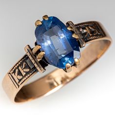 This beautiful circa late-Victorian ring contains one (1) cushion mixed cut natural sapphire weighing 1.92 carats and set into a four-split prong head. Engraved details accent the shoulders of the shank. The ring measures 10.2mm at the top, rises 4.0mm above the finger, tapering to 3.4mm wide and 0.6mm thick at the base of the shank. The ring is currently size 7.5 and has a nice aged patina. Period Jewelry, Sapphire Antique Ring, Antique Gold Rings, Victorian Ring, Antique Ring, Victorian Rings, Unusual Jewelry, Aquamarine Jewelry, Cabochon Ring