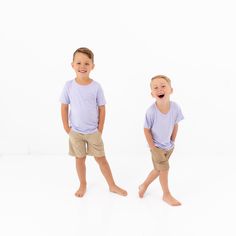 This essential tee is a staple for every toddler wardrobe. A V-neckline adds casual style to any outfit, while the stretchy, breathable material keeps little ones cool all day on the playground. Buttery soft to the touch, this tee is extra gentle even on the most sensitive skin. Match it to the Women's Relaxed Fit V-Neck for the perfect Mommy & Me outfits! 97% Rayon made from Bamboo, 3% Spandex V neckline Relaxed fit Family Matching Solid Color Short Sleeve Tops, Family Matching Short Sleeve Tops, Playful Solid Color Tops For Playwear, Playful Short Sleeve Top, Casual Solid Tops For Playtime, Basic T-shirt For Summer Playtime, Toddler Wardrobe, Mommy Me Outfits, Mommy And Me Outfits