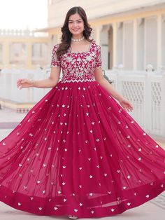 Embrace the vibrant elegance of this rani pink georgette gown, exquisitely embellished with dazzling sequin embroidery work. Designed to make you stand out, this gown is perfect for sangeet ceremonies and other grand celebrations. Fully stitched and available in sizes XS to XXL, it ensures a perfect fit for all body types. With a 3.5-meter flair that adds a graceful flow and a gown length of 56 inches, this piece promises a striking and elegant silhouette.
Ideal for a variety of occasions such a Sequin Gown For Eid Reception, Sequin Chinon Dress For Reception, Floor-length Gown With Dori Work For Diwali, Embellished Chinon Floor-length Dress, Embellished Floor-length Chinon Dress, Embellished Georgette Lehenga In Maxi Length, Embellished Georgette Lehenga Maxi Length, Semi-stitched Sequin Dress For Reception, Festive Chinon Dress With Sequins