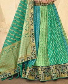 Fabric Details: Blouse: Banarasi Silk Blouse Color : Morpich Blouse Piece Length: 1-1.2 meters Lehenga: Banarasi Silk (Customise upto 42") Lehenga Type: Circular Lehenga Gher: 3.5+ meters Lehenga Length: Max 42 Inch Lehenga Color: Rama Pista Firozi Dupatta: Banarasi Silk Dupatta Length : 2.5 meters Dupatta Color: Rama Pista Lehenga Type, Lehenga Banarasi, Georgette Material, Black Lehenga, Grace To You, Net Dupatta, Georgette Fabric, Silk Dupatta, Fabric Details