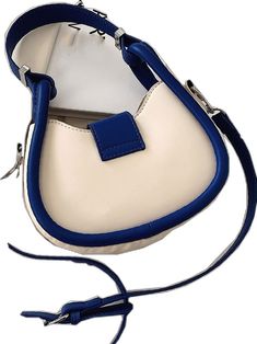 Trendy Blue Baguette Shoulder Bag, Trendy Blue Shoulder Baguette Bag, Trendy Blue Satchel Baguette Bag, Trendy Blue Crossbody Baguette Bag, Chic Blue Handheld Baguette Bag, Chic Blue Crossbody Baguette Bag, Blue Satchel Baguette Bag With Detachable Strap, Blue Baguette Satchel Bag With Detachable Strap, Blue Crossbody Baguette Bag With Detachable Strap