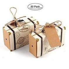 two boxes are wrapped in brown paper and tied with twine