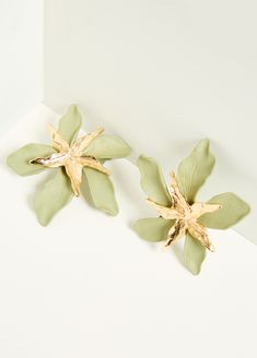 Textured petals are beautifully realistic as they're illuminated by gilded accents on our clip-on earrings. Gold Petal Earrings For Party, Gold Flower Clip-on Earrings For Spring, Gold Clip-on Earrings For Spring Party, Spring Party Gold Clip-on Earrings, Ashley Stewart, Flower Clip, Accessories Jewelry Earrings, Gold Floral, Gold Texture