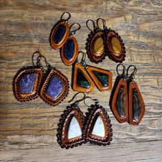 Hand picked matching stones inlayed in English tanned leather with a wax finish - stainless steel hooks and bails -English (rust color) tanned -Wax finish coat -Double leather totaling 6oz thickness $Find more of my rustic hand made designs https://www.etsy.com/shop/KCsDesignsShop #Message for coupons and sale codes if you can't find them on-site. Hand Tooled Adjustable Jewelry For Everyday, Leather Teardrop Earrings For Everyday Use, Bohemian Hand-tooled Leather Earrings, Elegant Brown Leather Jewelry, Unique Brown Teardrop Earrings, Handmade Leather Everyday Earrings, Everyday Handmade Leather Earrings, Handmade Leather Earrings For Everyday, Artisan Hand-tooled Teardrop Earrings