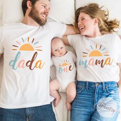 Celebrate your baby's 1st trip around the sun and wear these matching boho-inspired sunshine birthday shirts for the whole family! SHIRT DETAILS * Bella+Canvas - Adult, Youth, and Toddler shirts * Rabbit Skins - Baby shirts and bodysuits * Next Level - Women's tank tops * Gildan - alternative option if the primary brand is out of stock * 100% soft cotton SIZING * Our shirts are unisex - Run true to size and have a relaxed fit. Order one size smaller for a further slim fit. * If you are unsure about what size to order, please refer to the size chart in the photos or reach out to us. * To measure, lay your favorite shirt flat. Measure armpit to armpit and the length, then compare to the size chart in the photos. * Incorrect size can not be refunded or exchanged. DIRECT TO GARMENT PRINTING (D Matching Family T-shirts For Summer, Playful Tops For First Birthday In Summer, Fun Summer T-shirt For First Birthday, Playful Summer Family T-shirt, Playful Summer Tops For First Birthday, Summer Cotton Top For First Birthday, Summer Matching Custom Print Tops, Playful Family T-shirt For Summer, Custom Printed T-shirt For First Birthday In Summer