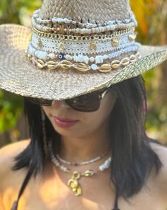 This is for a CUSTOM, MADE TO ORDER piece!  Please message me with your style ideas before you place your order!  Thank you!  Introducing our bespoke Custom Coastal Cowgirl Cowboy Hat, where the charm of the West meets the allure of the coast in a personalized masterpiece. Handcrafted to order, this straw cowboy hat is a celebration of individuality and style, designed to reflect your unique personality and love for coastal living. Adorned with multiple bands of seashell beads in varying sizes a White Beaded Hat Bands For Summer, White Handmade Hats For Beach Season, White Handmade Hat For Beach Season, Handmade White Hats For Beach Season, Handmade White Hat Bands For Beach, Handmade White Mini Hats For Beach, White Bohemian Bucket Hat, White Handmade Beach Hats, Bohemian Beaded White Hat Bands